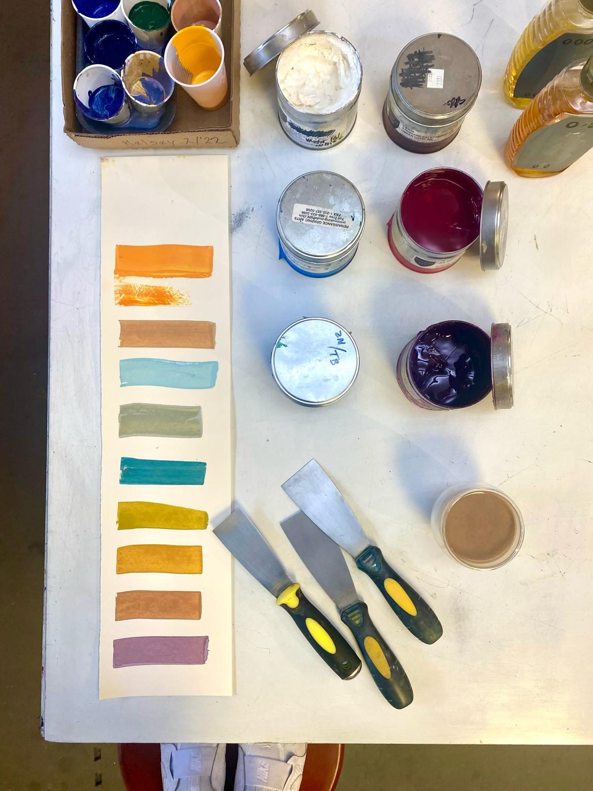 Colour swatches drying on the studio counter