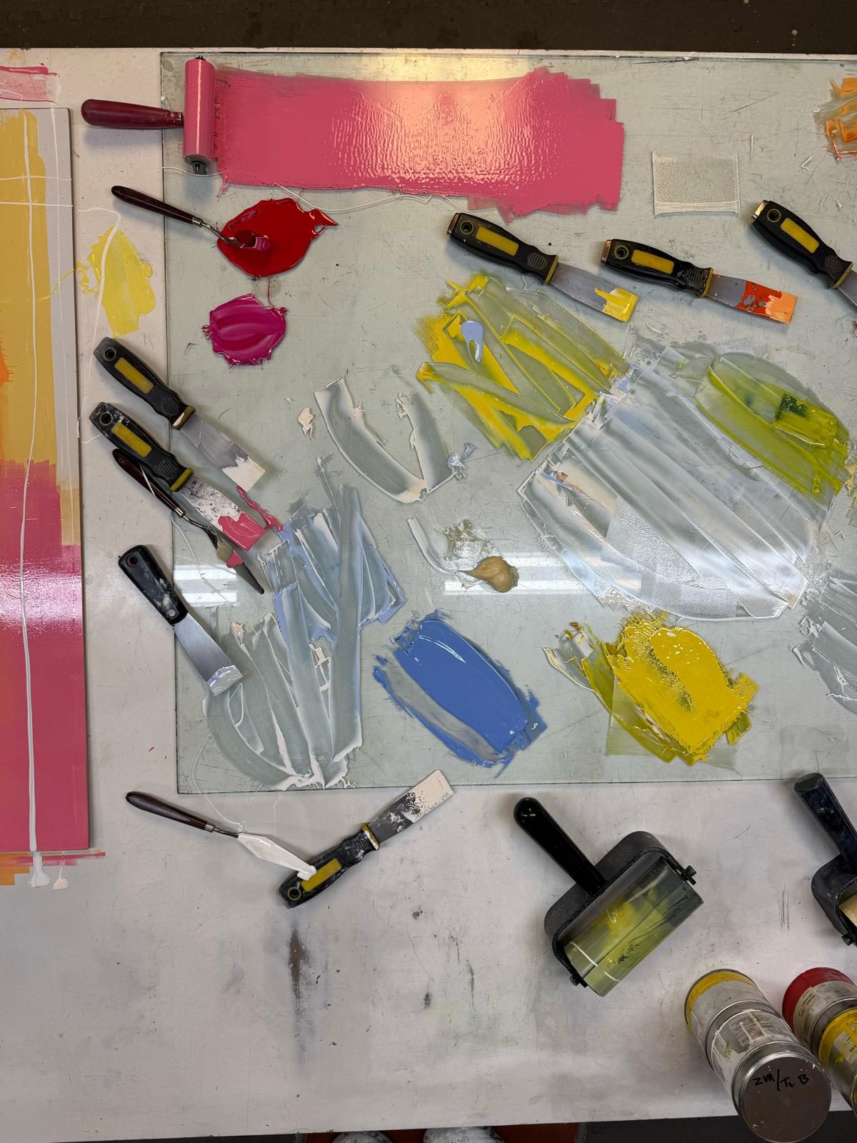 Paints, palette knife and printmaking tools