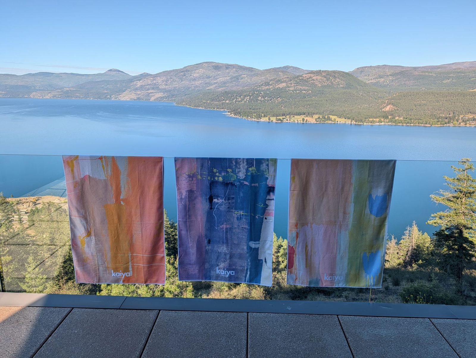 Three Kaiya towels over the lake